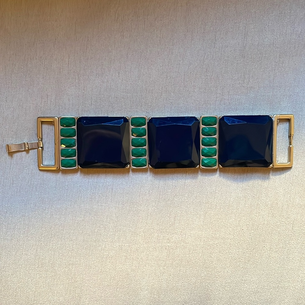 Gold bracelet with navy & green stones